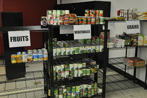 Food pantry with items on shelves.