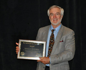 Huntington holding award.