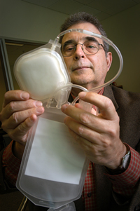 Dr. Reuben Carbonell and his blood filter unit.