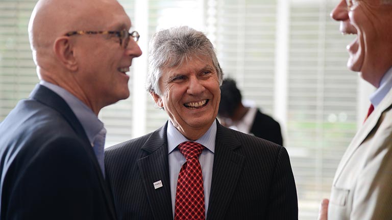 Poole College of Management Dean Ira Weiss (center) holds the first endowed deanship in NC State history.