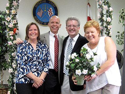 Rob Maddrey and Mark Tulbert, surrounded by friends, celebrate their wedding in 2010 on the 25th anniversary of the day they met.