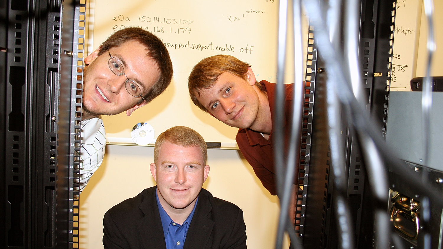 Ready for their album cover? From left, Friday Institute music video stars Lodge McCammon, Sammy Carter and Brian Bouterse keep an eye on the institute's servers.