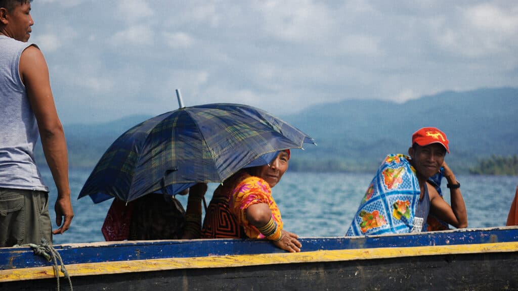 A Kuna woman in a boat.