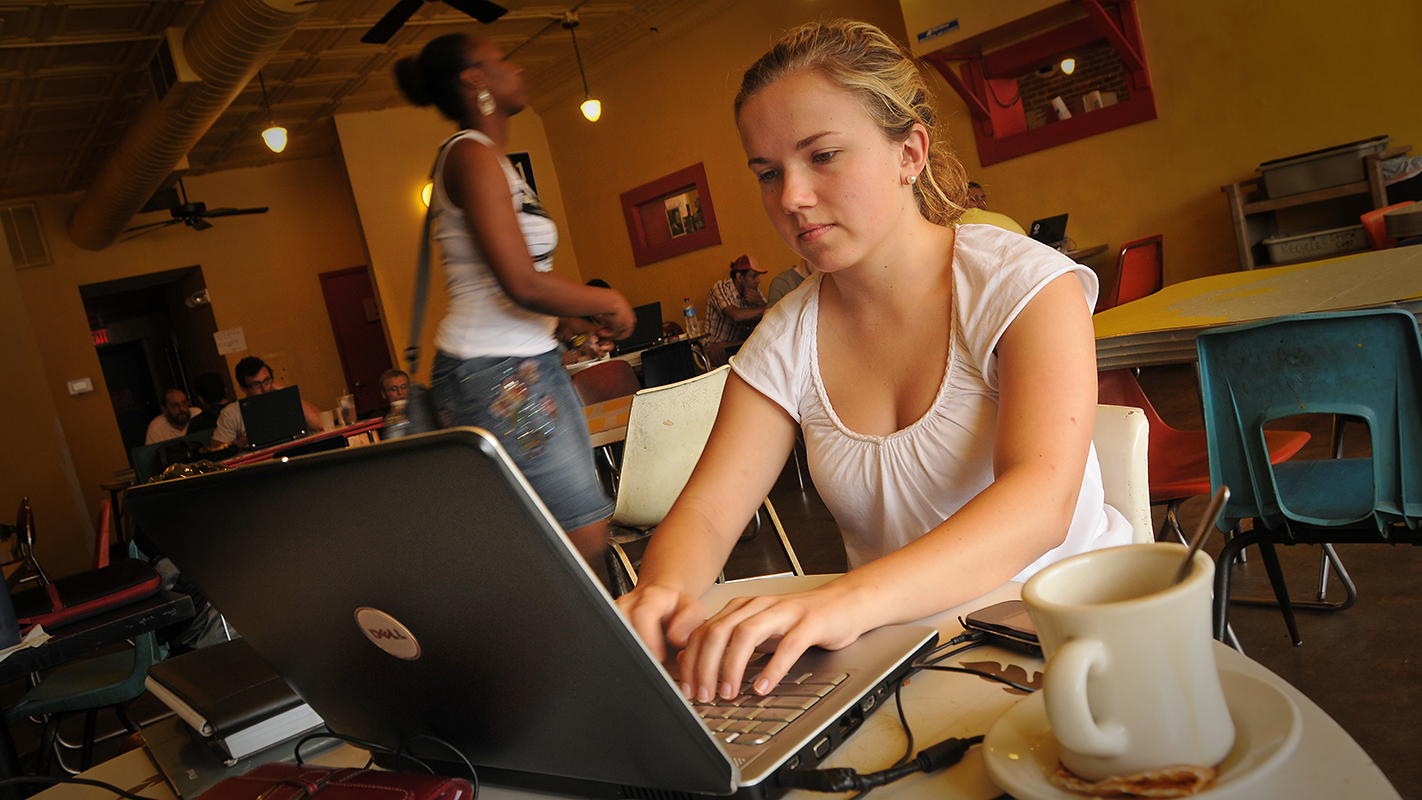 Student studies for an exam at Cup-a-Joe's on Hillsborough Street.