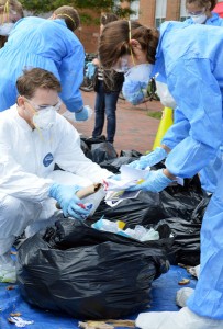 Students conduct a waste audit of all the discarded material in Nelson Hall as part of their analysis of sustainable operations.