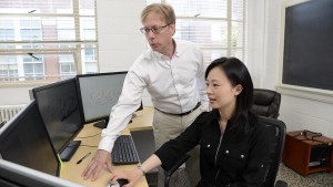 Fred Wright (left), director of the Bioinformatics Research Center and Yi-Hui Zhou, research associate professor of biological sciences, apply big-data methods to human health problems.