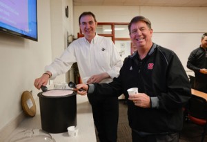 Carl Hollifield (left) and NC State women's head coach Wes Moore.