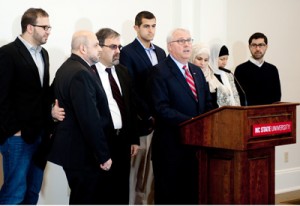 Chancellor Randy Woodson, surrounded by members of the Barakat and Abu-Salha families, announces the Our Three Winners Fund on Friday.