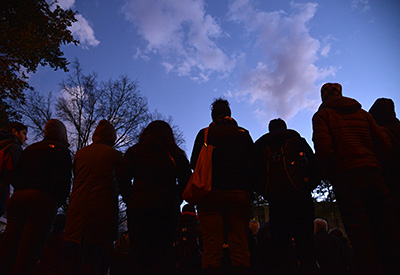 An evening vigil on the Brickyard caps an emotional and wrenching week for the Wolfpack family.