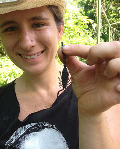 While conducting soil tests, Cruz's Salvadoran host caught a scorpion and taught her how to hold it without getting stung. Photo courtesy of Angel Cruz.