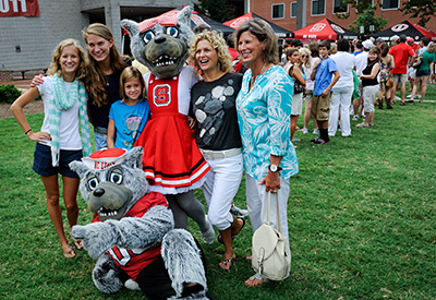 Mr. and Ms. Wuf celebrate with incoming students and family members at the Legacy Luncheon. Photo by Becky Kirkland.