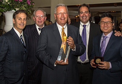 Kabiller Prize recipients Joseph DeSimone (center) and Warren Chan (far right) are honored by Northwestern’s International Institute for Nanotechnology. Also pictured are Northwestern trustee and alumnus David G. Kabiller (far left), Vice President Eric Neilson (second from left) and IIN Director Chad Mirkin (second from right). Photo by James Connolly.