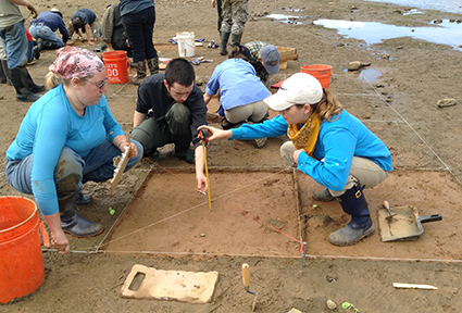 NC State students preparing to excavate. Clockwise – Heather Paxon (Graduate Student); Ian Beggan (undergraduate); Jordan Karlis (Graduate Student). Photo credit: Jeanette Cole. Click to enlarge.