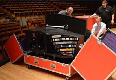 The organ comes on a single large truck and is assembled from modular sections.
