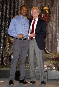 NC State long jumper Jonathan Addison and longtime track and field coach Rollie Geiger.