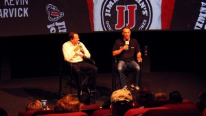 Winston Kelley (left), NC State grad and executive director of the NASCAR Hall of Fame, interviews driver Kevin Harvick during a Hall event.