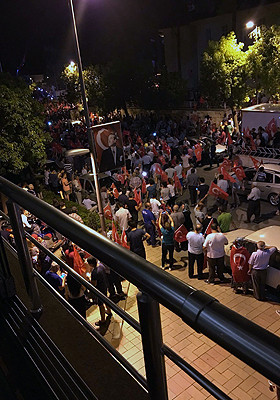 Demonstrators outside hotel in Antakya, Turkey, where a group of NC State students and alumni were staying. Photo: Farris Barakat.