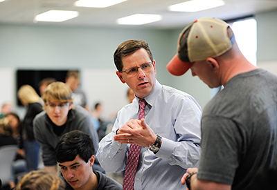 Jeff Joines’ hands-on teaching methods are popular with students in NC State’s demanding textile engineering program. Photos by Marc Hall.