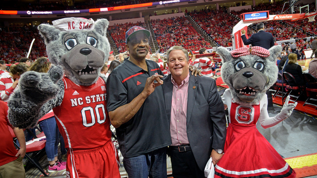 Randy Ramsey with Mr. and Ms. Wuf and NC State basketball legend David Thompson.