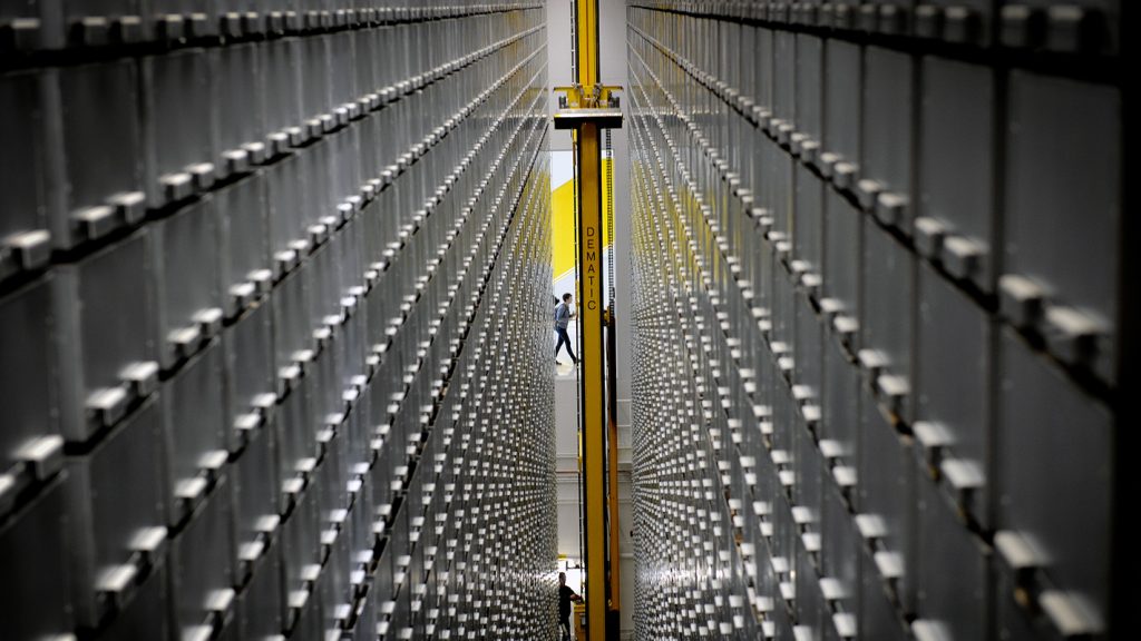 Rows of book bins within the bookBot at NC State's Hunt Library.