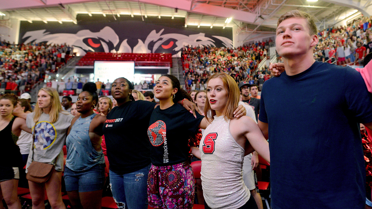 A group shot of students in Reynolds Coliseum during NC State's 2017 convocation.