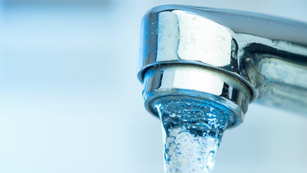 A faucet and drinking water.