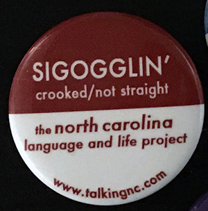 Pin that says Sigogglin'