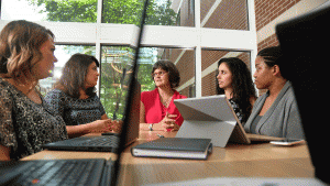 NC State researcher Jane Hoppin meets with students on her team to discuss their GenX community exposure study.