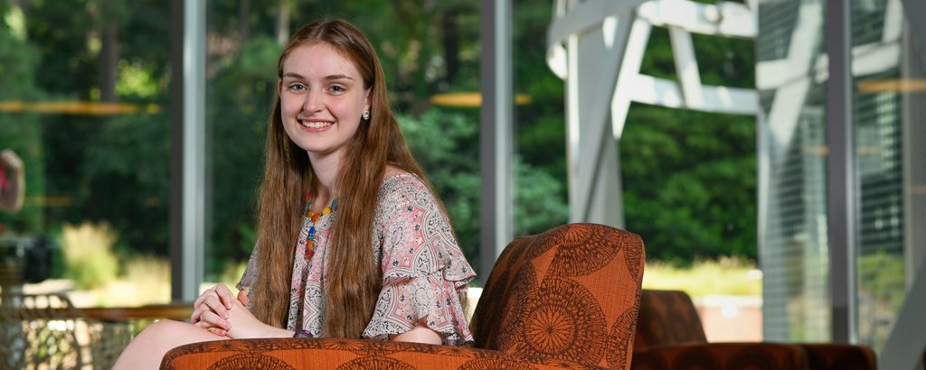 NC State student Alex Tobey sitting in Talley Student Union.