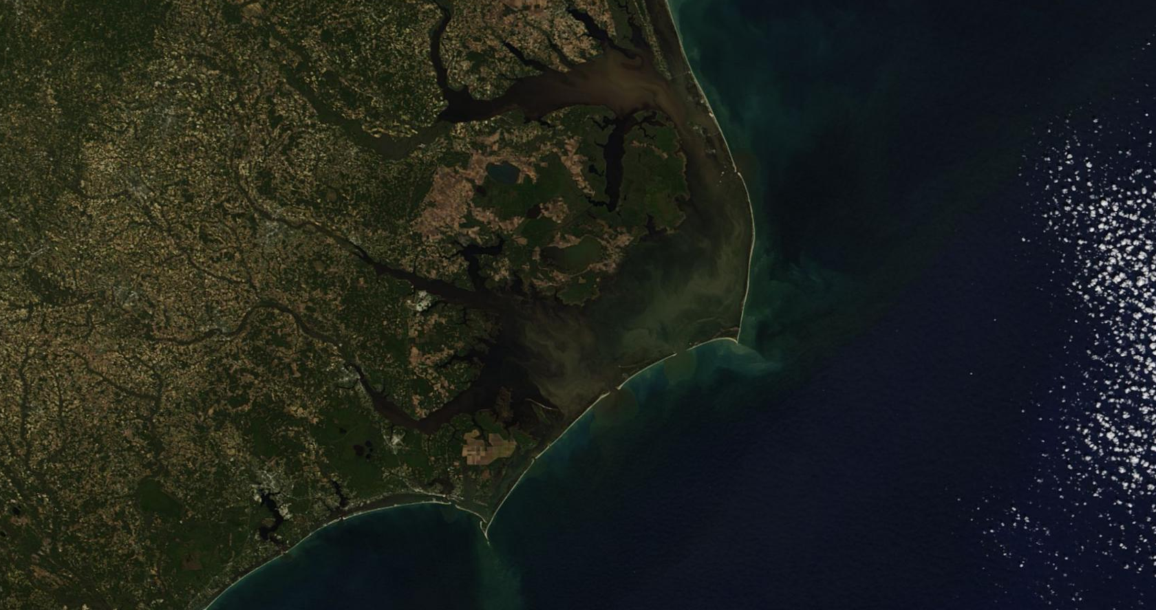 Organic matter washed into Pamlico Sound by Hurricane Matthew. Credit: NASA Terra/MODIS visualized using Zoom Earth