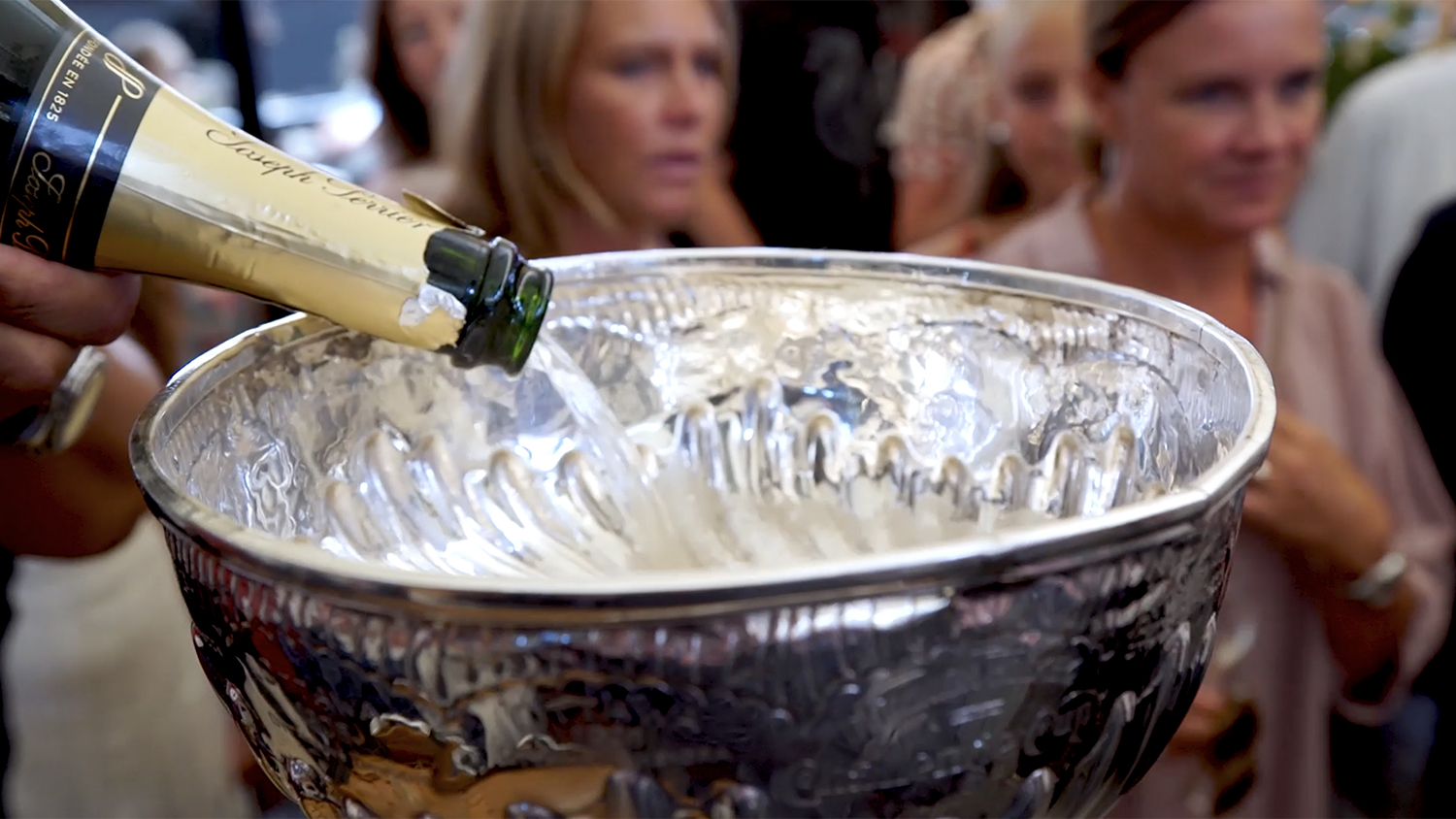champagne being poured into the Stanley Cup