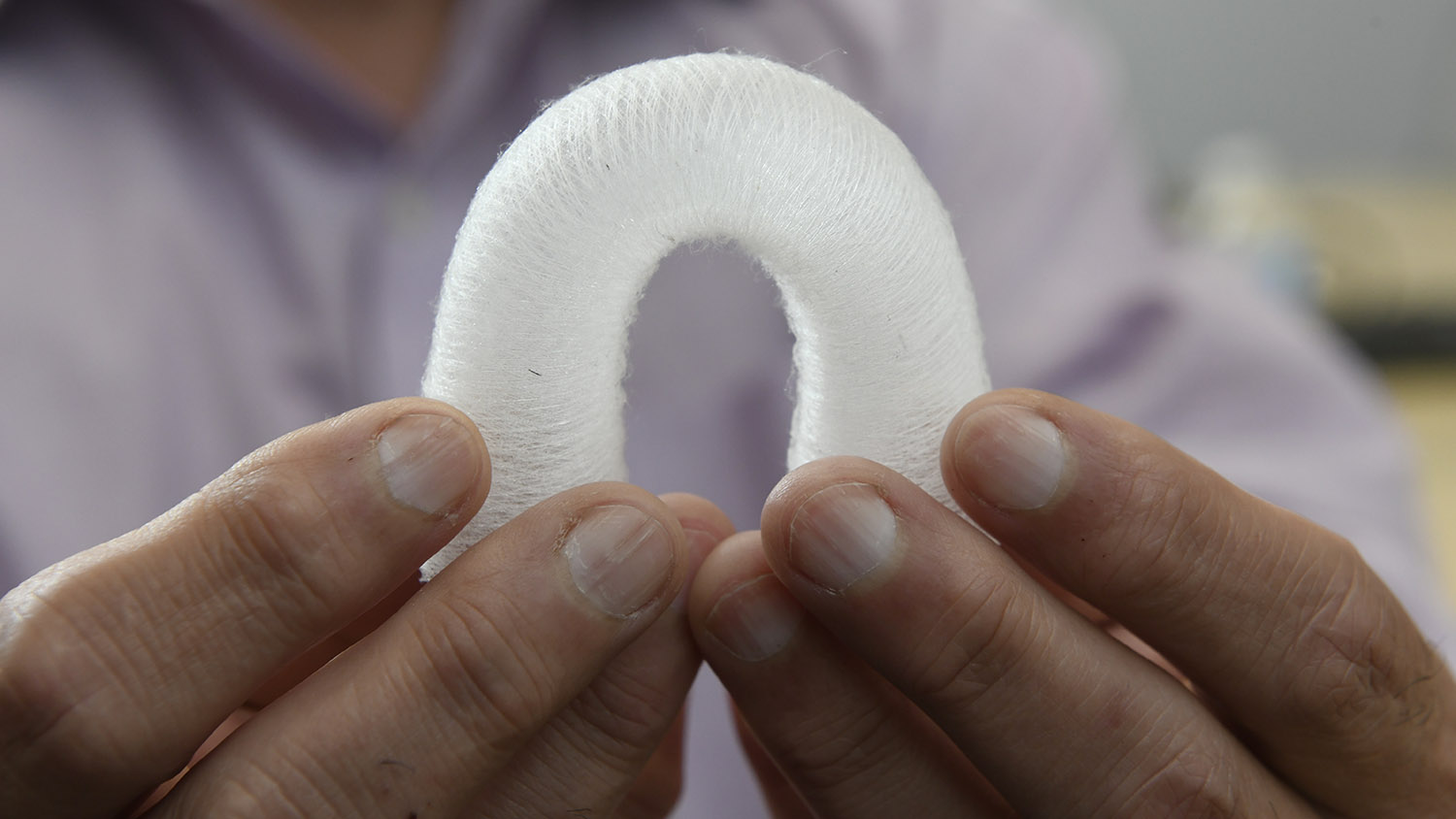 A 3D printed aorta created using the device is flexed to show the unique properties and structure of the fiber printed output.