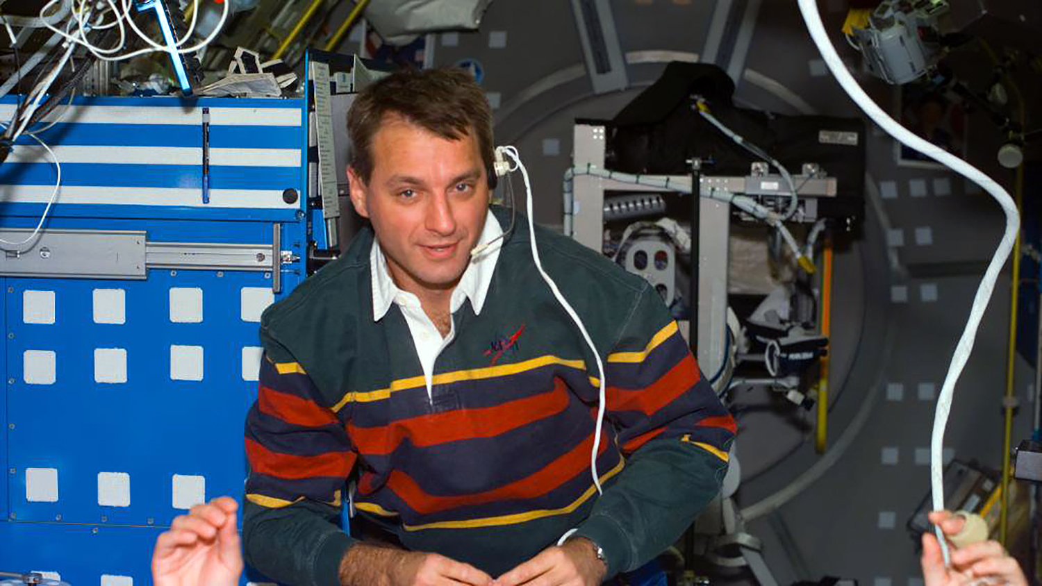 Richard Linnehan, NASA's first-ever veterinary astronaut, floating in space.