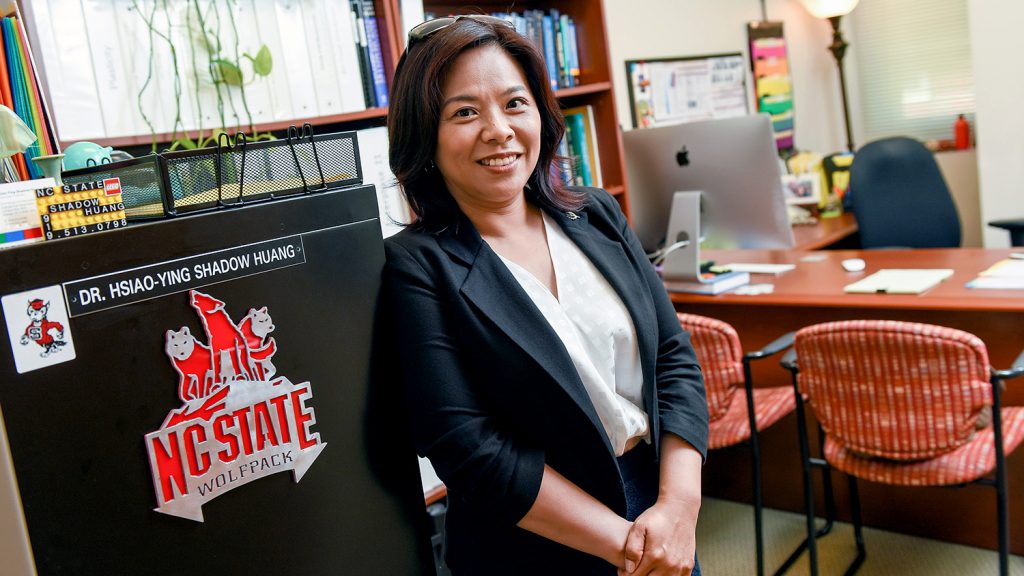 Shadow Huang in the doorway of her office.