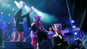 Delta Rae and the Wufs embrace on stage at Packapalooza 2019