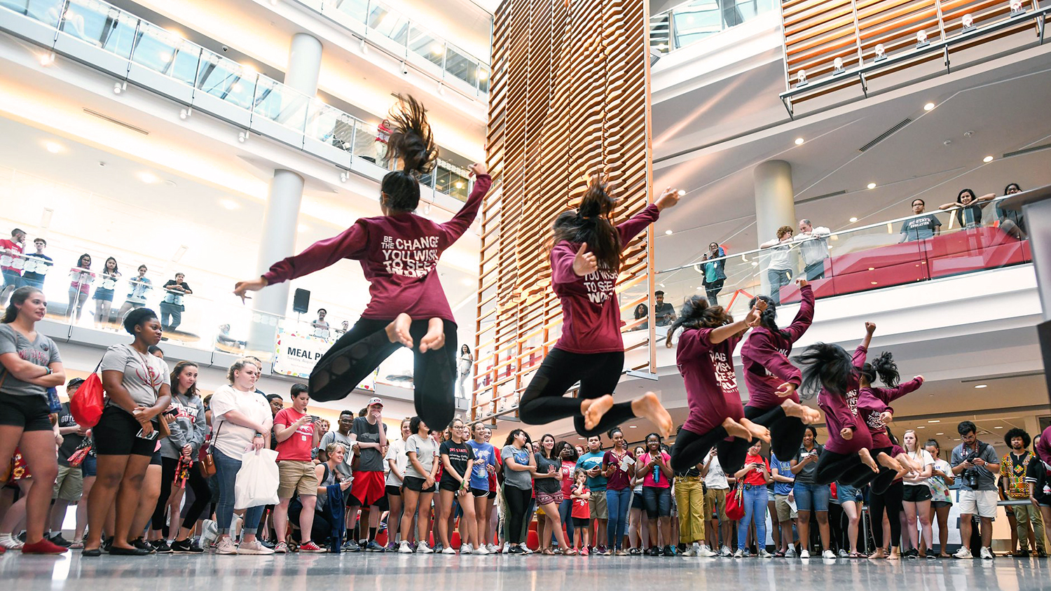 Students dance for a crowd as part of Wolfpack Welcome Week in Talley Student Union.