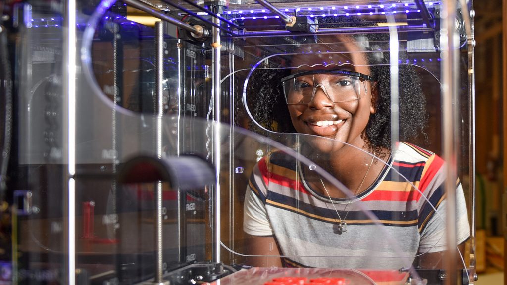 NC State student Niambé James using a 3D printer at the College of Natural Resources.