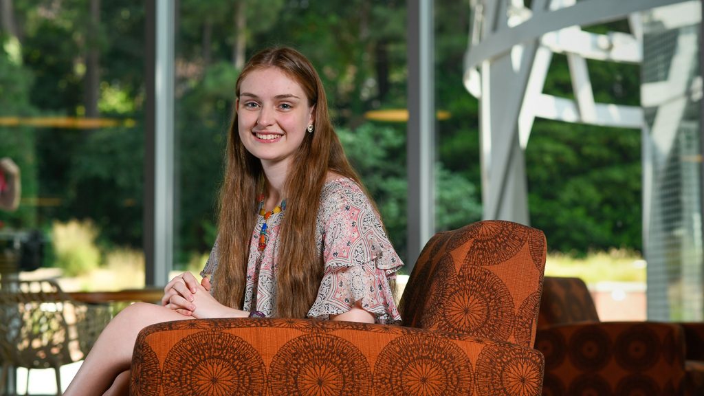 NC State student Alex Tobey sitting in Talley Student Union.