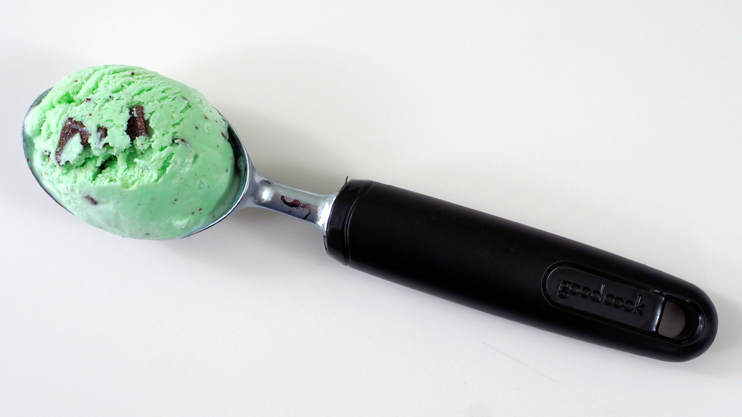 A scoop of Chocolate Chip mint ice cream on a scooper