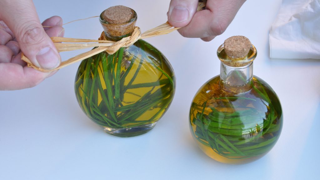two bottles of infused oil