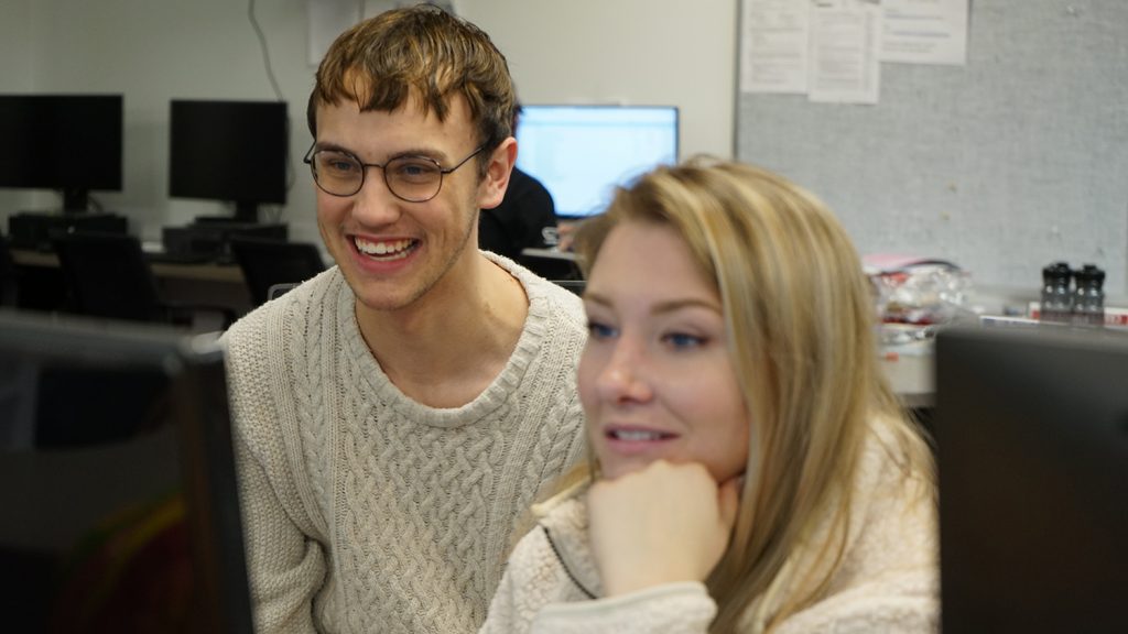 Assistant Arts and Entertainment Editor Austin Dunlow and Copy Editor Kyleigh Toomey edit content on Jan. 27, 2020.
