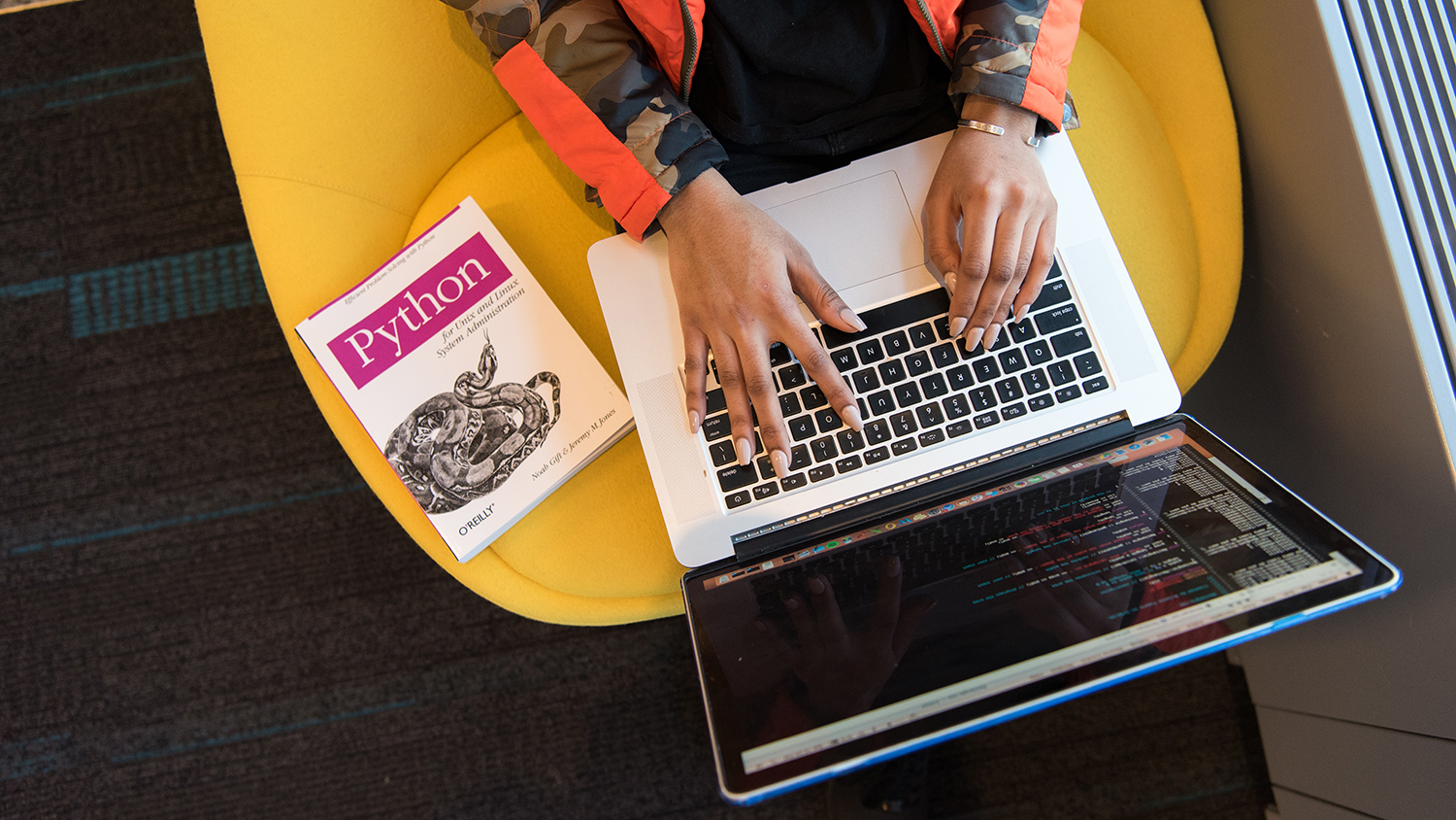 woman types on computer