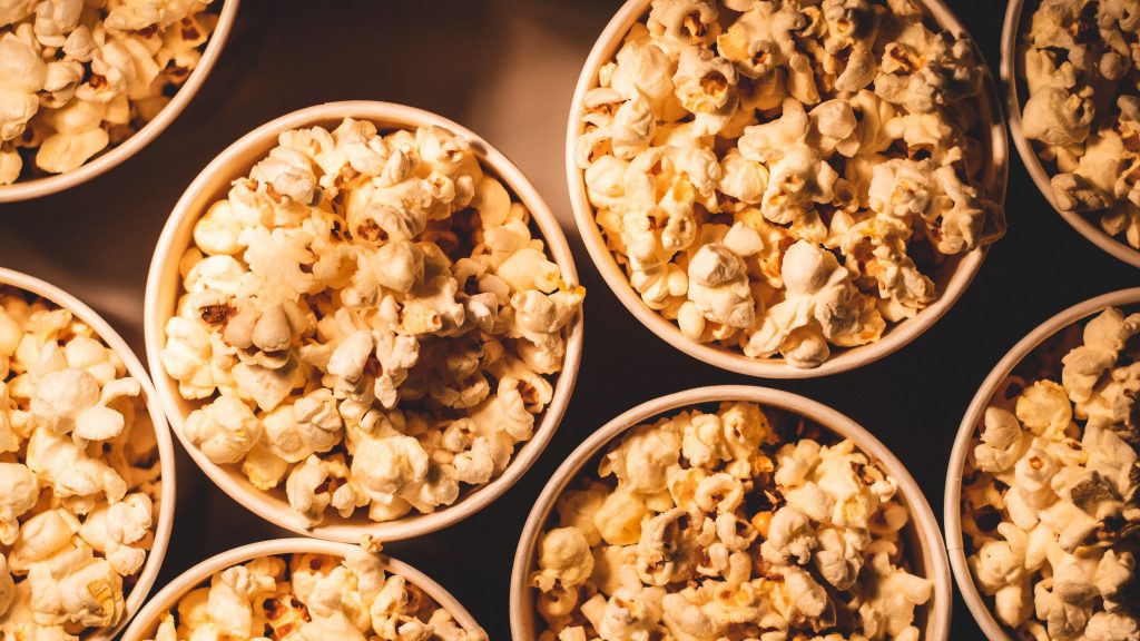 Buckets of movie theater popcorn