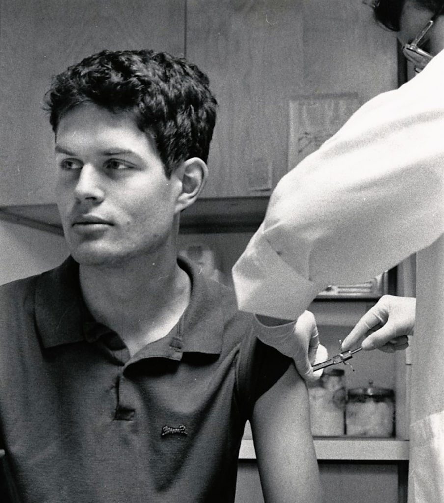 A student is vaccinated by a doctor during the 1989 measles outbreak.