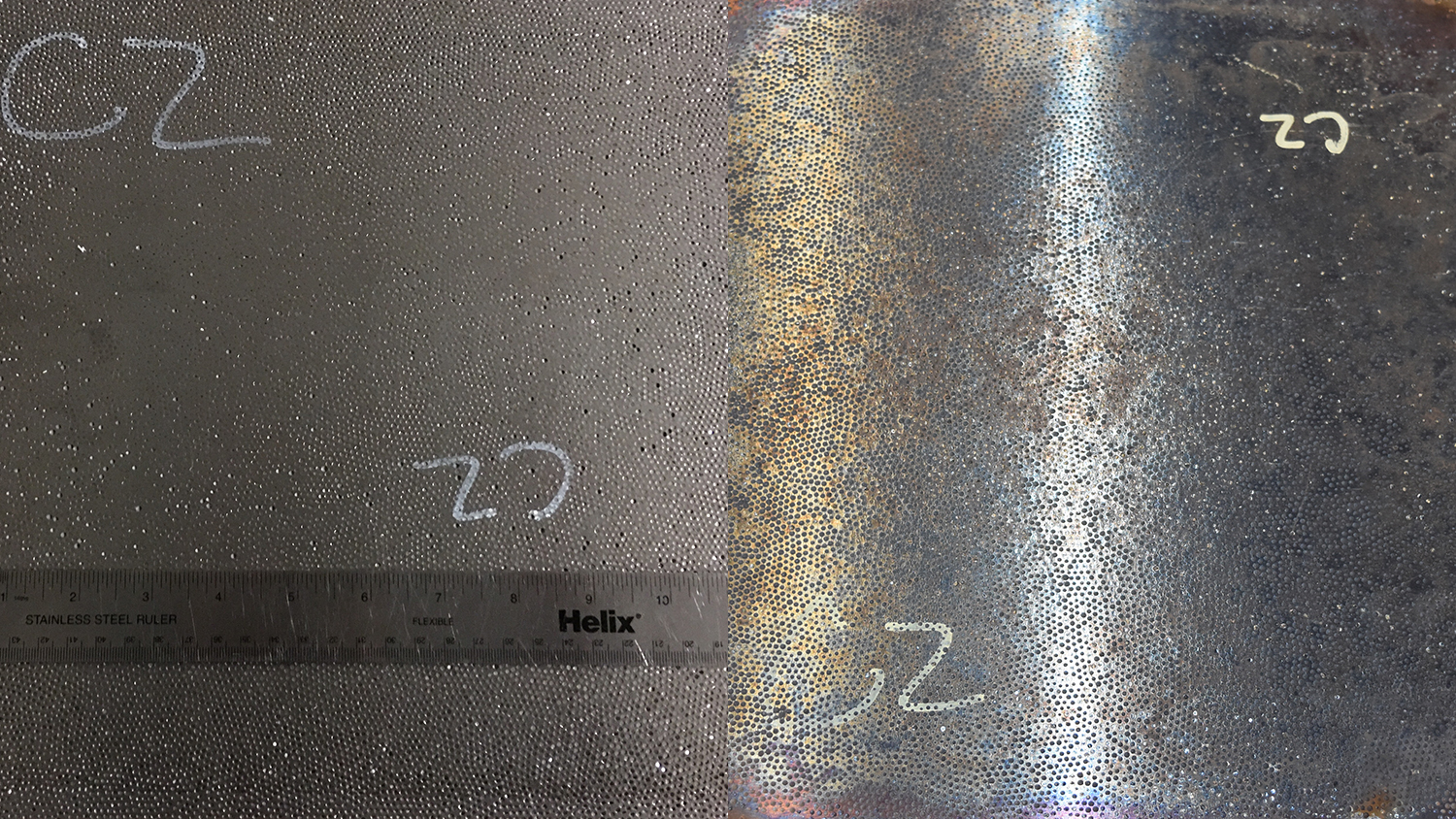 metal surface with ruler at left; shinier metal surface at right