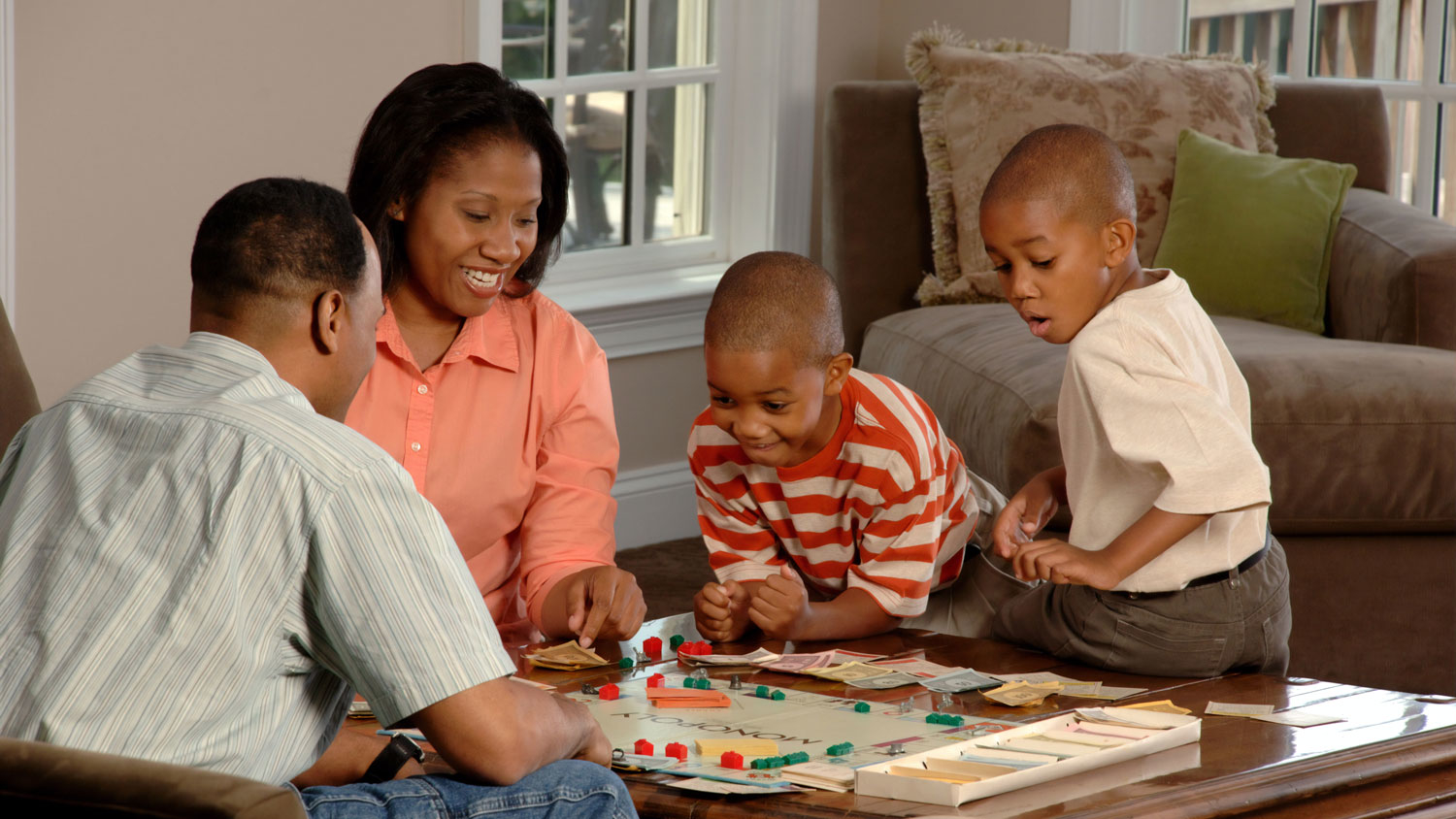 A family playing a board game together