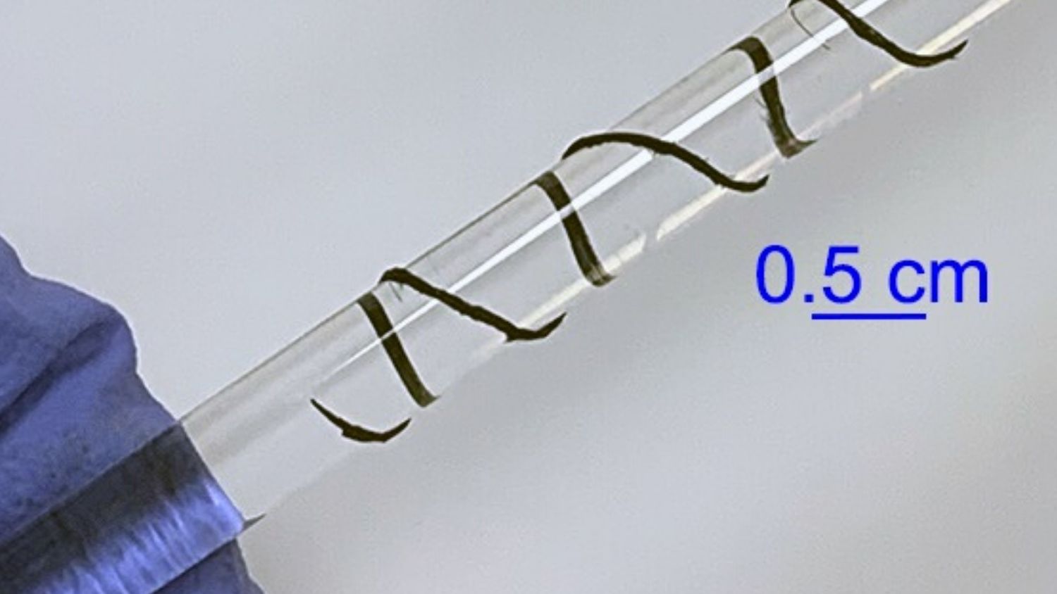 Carbon nanotube material wound around a tube.