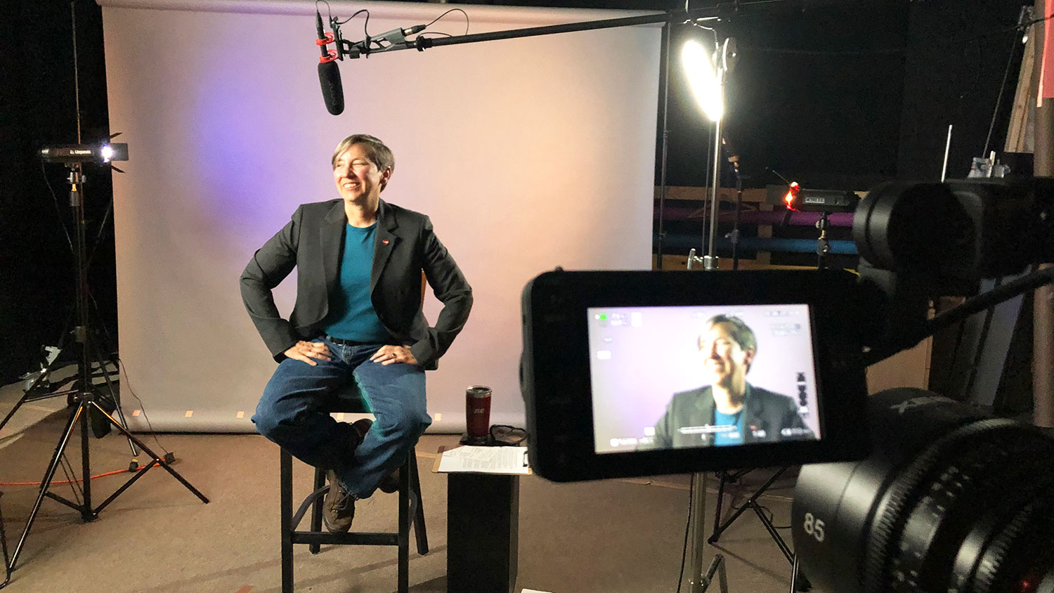 Jane Lubischer filming a segment of the Wicked Problems, Wolfpack Solutions online course