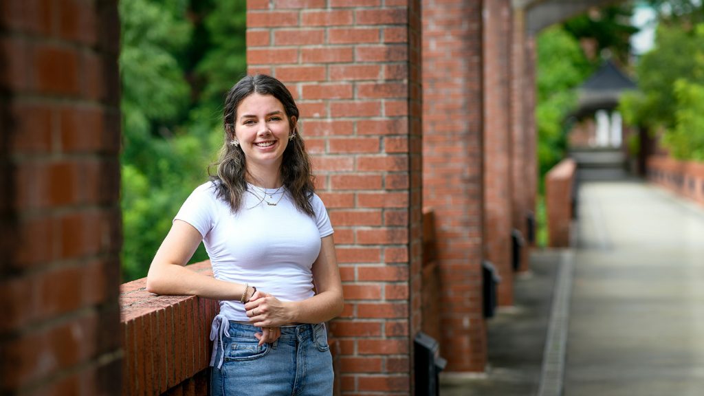 Laura Cooper stands for a portrait on NC State's campus.