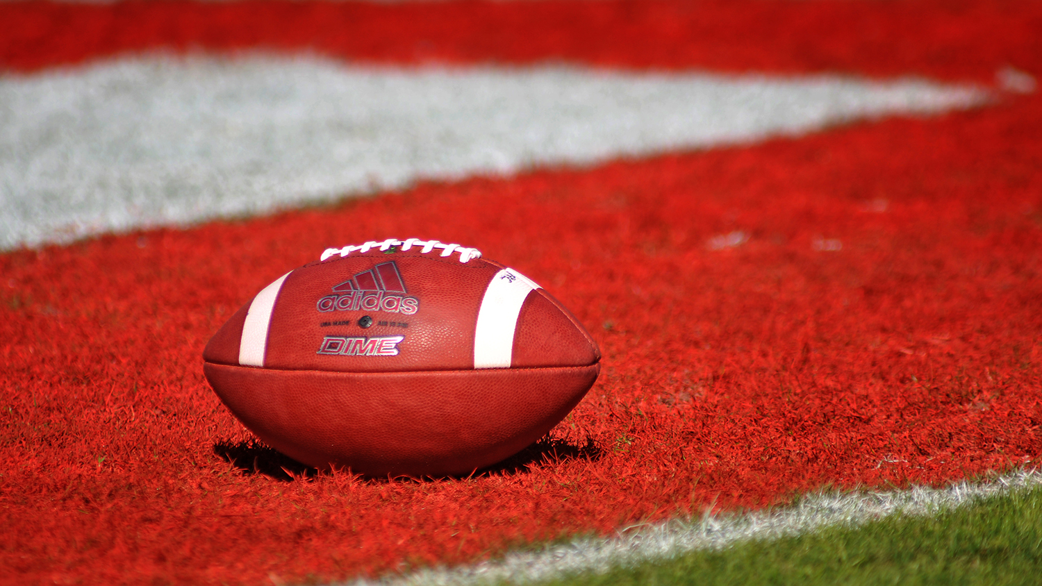 Football rests in the end zone after a Wolfpack touchdown in Carter-Finley Stadium.